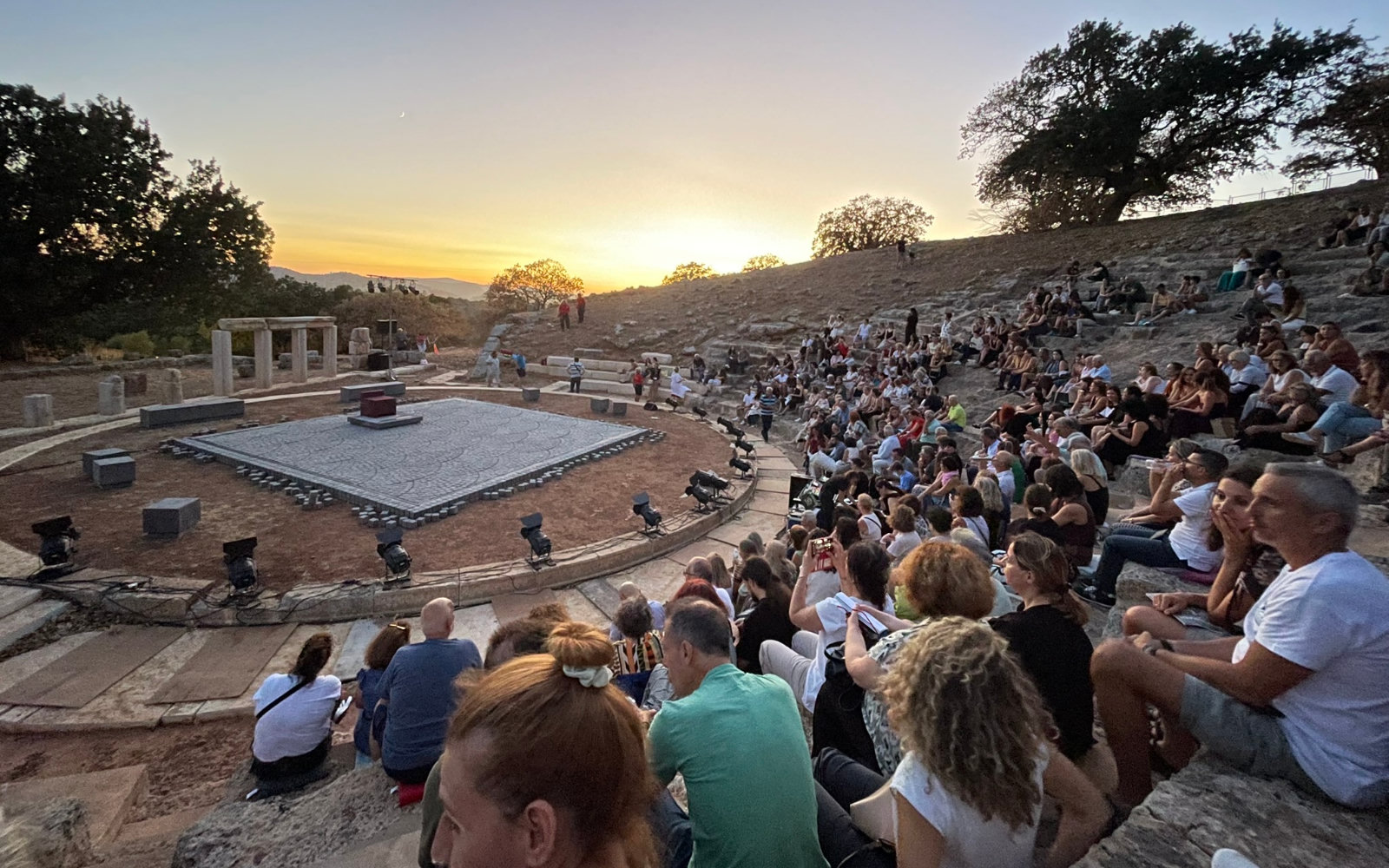 An evening in an ancient Greek theatre setting